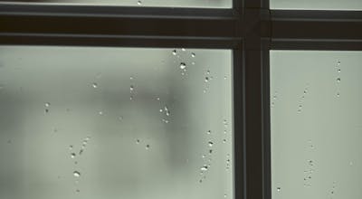 Self-cleaning double glazing unit with photocatalytic coating